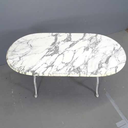 3034 - An oval marble-topped garden table on cast iron frame. 120x73x60cm.