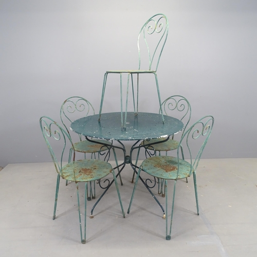 3049 - A painted metal circular topped garden table, 97x74cm, with five matching stacking chairs.