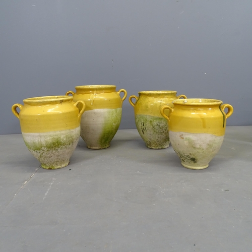 3054 - Four various French ceramic drip-glazed confit pots. Tallest 29cm.