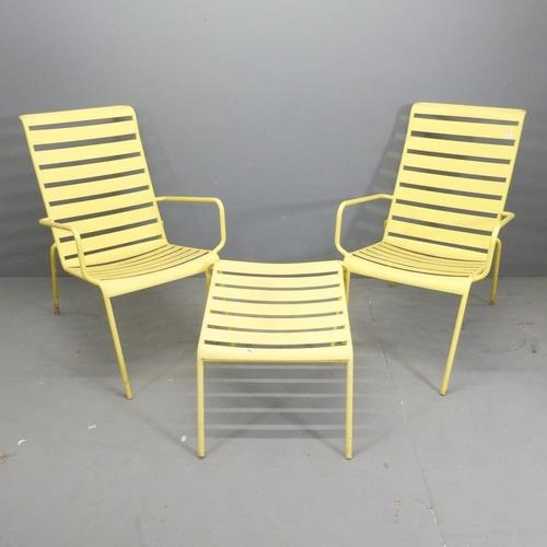 3059 - A pair of modern painted metal garden loungers, with matching table / footstool.