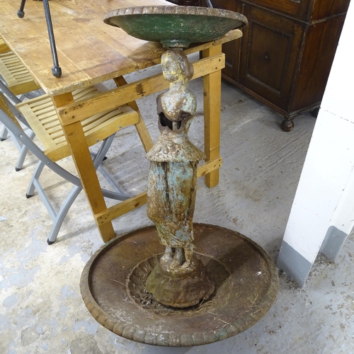 3070 - An antique painted cast iron water fountain, with figural support. A/F. Height 85cm.