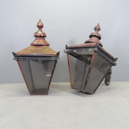 3075 - A pair of Victorian style copper lantern exterior wall light fittings. 43x82cm.