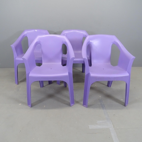 3079 - A set of four plastic stacking garden chairs.