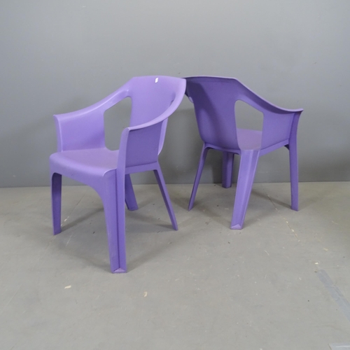 3079 - A set of four plastic stacking garden chairs.