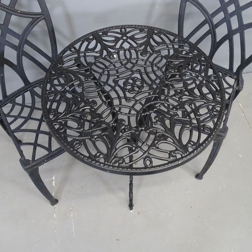 3099 - A painted aluminium circular garden table and two similar chairs. 61x69cm.