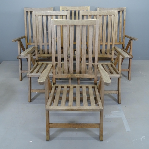 3107 - A set of six weathered teak folding garden chairs.