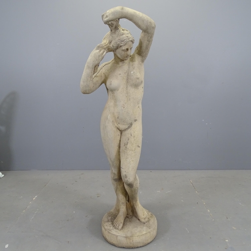 3118 - A concrete garden statue, study of a nude lady. Height 117cm.