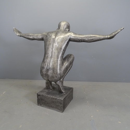 3120 - After Marco Olivier - A brushed aluminium sculpture, study of a naked man with outstretched arms. He... 