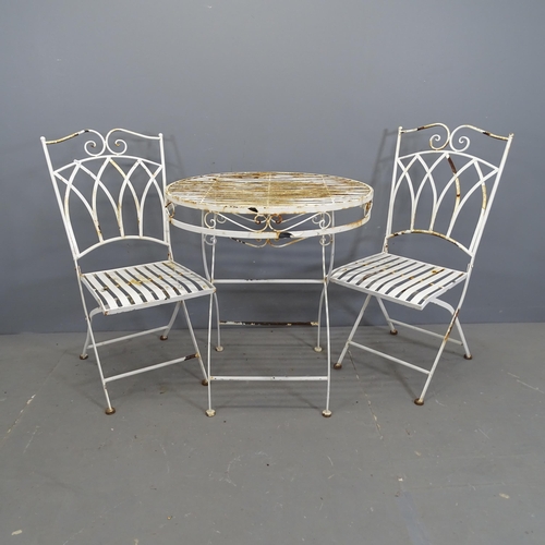 3122 - A painted metal folding garden table, 70x76cm, and a pair of matching chairs.