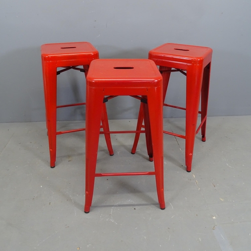 3125 - A set of three Tolix style stacking stools. Height 68cm.