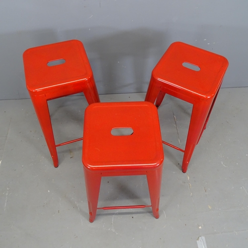 3125 - A set of three Tolix style stacking stools. Height 68cm.