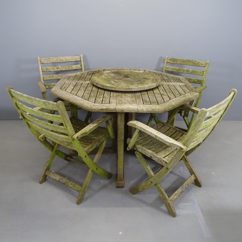 3126 - ALEXANDER ROSE - A weathered teak octagonal drop-leaf garden table and four folding chairs. 120x73cm... 