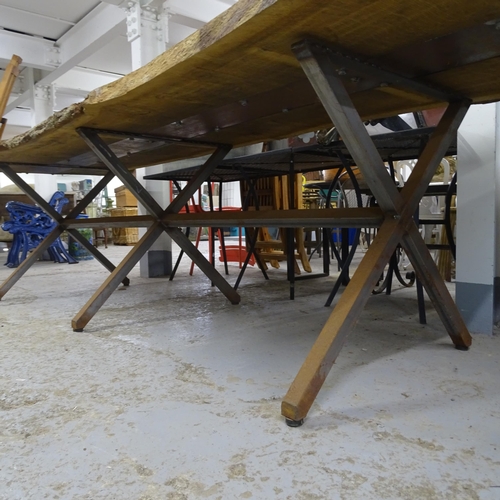 3138 - A large and impressive oak-topped live edge table on steel base. 300x80x110cm.