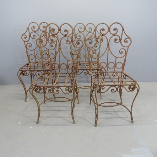 3140 - A set of four wrought iron garden chairs.