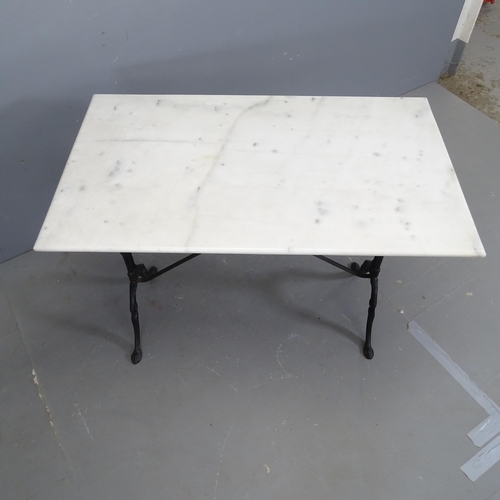 3150 - A French rectangular marble topped garden table on cast iron frame. 100x72x60cm.