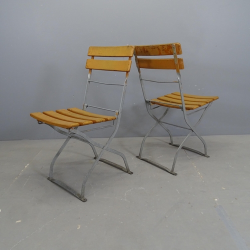 3153 - A set of four Parisienne folding bistro café chairs.