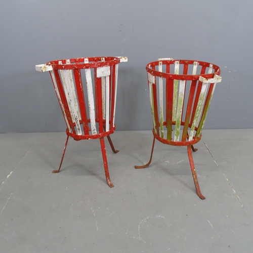 3158 - A pair of painted wrought iron plant stands. 45x60cm.