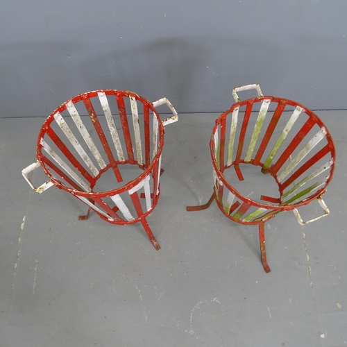 3158 - A pair of painted wrought iron plant stands. 45x60cm.