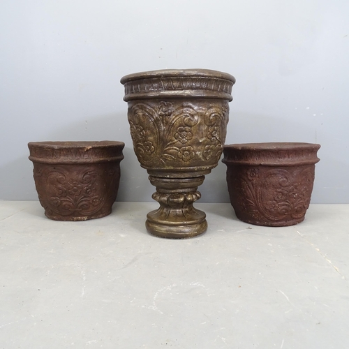 3164 - A two section concrete garden urn on stand, 43x57, and two similar concrete garden urns. (3)