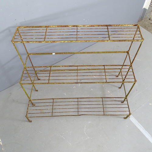 3165 - An antique wirework three-tier plant stand. 102x76x56cm.