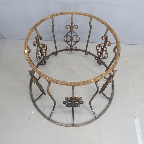 3181 - A painted wrought iron circular table base. 107x74cm.