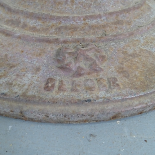 3182 - A French Art Deco circular marble topped bistro table on cast iron base. 55x71cm.