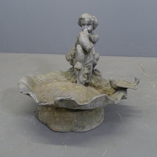 3188 - An antique lead birdbath with cherub / putti figure atop a scalloped dish. 42x35x42cm.