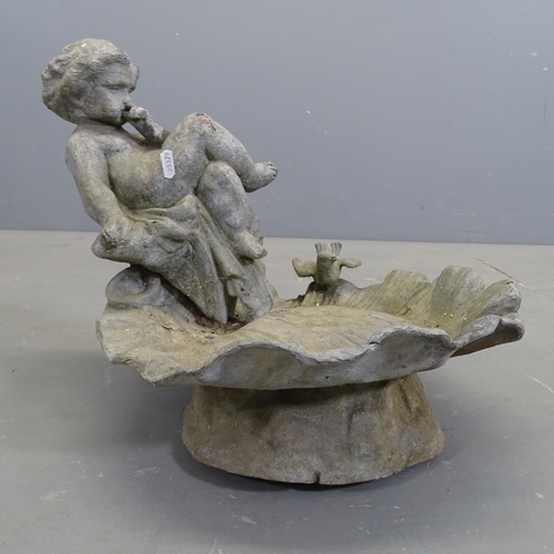 3188 - An antique lead birdbath with cherub / putti figure atop a scalloped dish. 42x35x42cm.