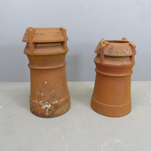 3189 - Two similar terracotta chimney pots. Tallest 60cm.