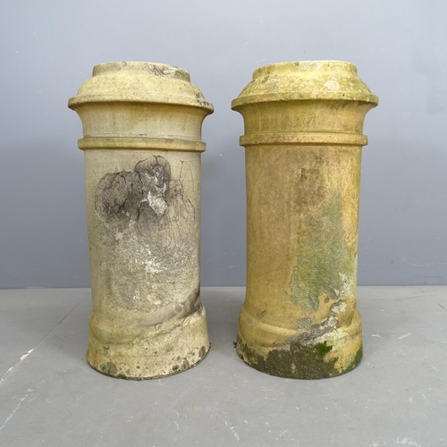 3190 - A pair of buff chimney pots, with impressed marks for Doulton Lambeth. 65x70cm.