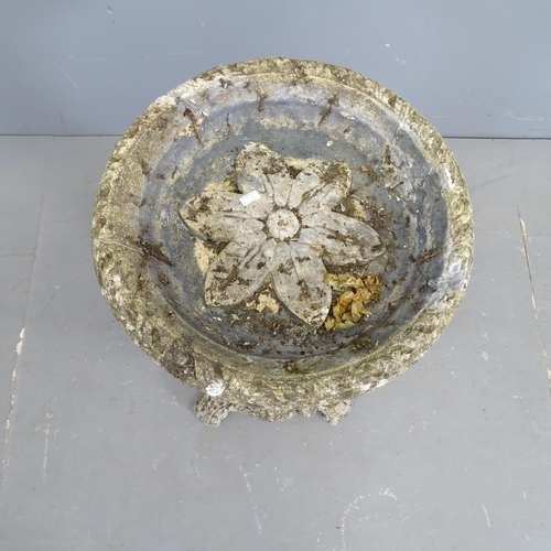 3193 - A weathered concrete two-section bird bath with squirrel decoration. 41x74cm.