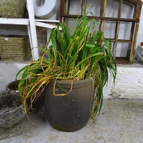 3198 - A large circular terracotta garden planter. 56x59cm.