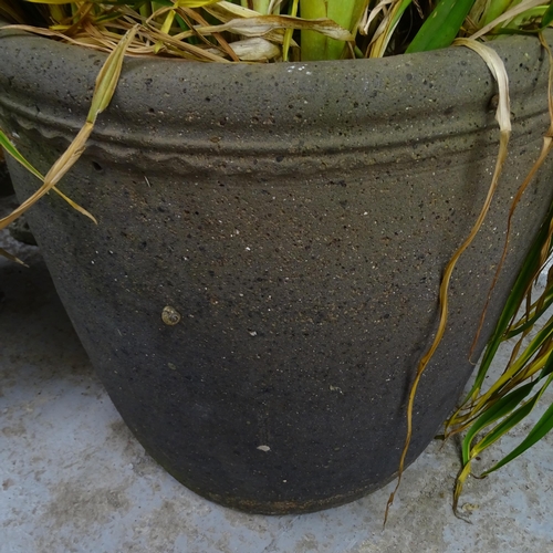 3198 - A large circular terracotta garden planter. 56x59cm.