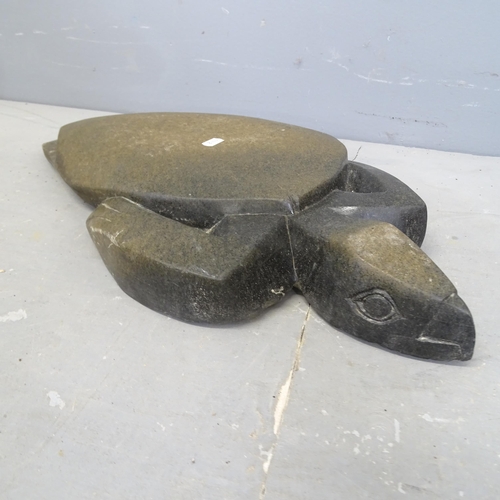 3203 - A Spring stone sculpture, study of a turtle. Length 51cm.