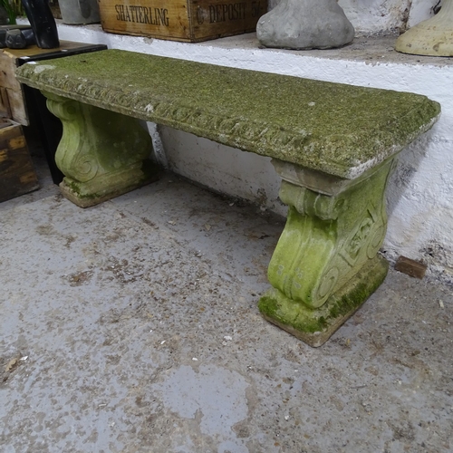 3207 - A weathered concrete three section garden bench. 114x47x39cm.