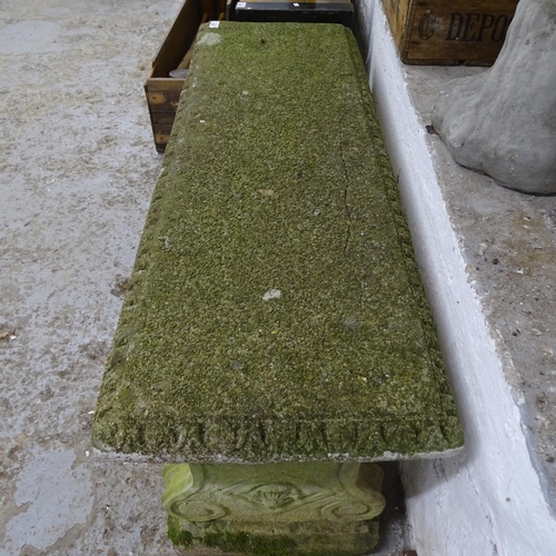 3207 - A weathered concrete three section garden bench. 114x47x39cm.