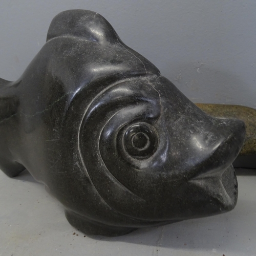 3209 - Two hand carved hardstone fish sculptures. Longest 34cm.