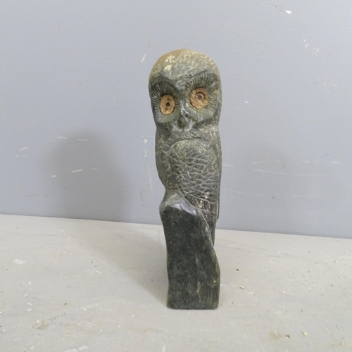 3214 - A hand carved hardstone sculpture, study of an owl. Height 24cm.