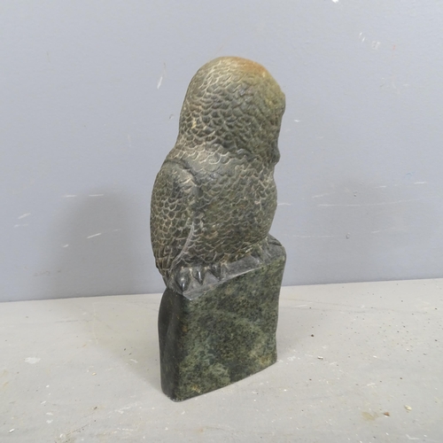 3214 - A hand carved hardstone sculpture, study of an owl. Height 24cm.