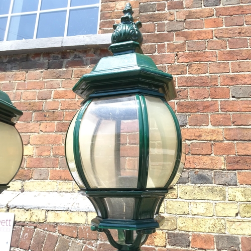 3229 - A pair of Victorian style cast aluminium street lamps or lanterns (to be rewired). Height 228cm.