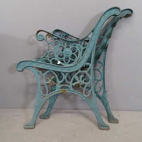 3235 - A pair of painted cast iron bench ends. Height overall 70cm.