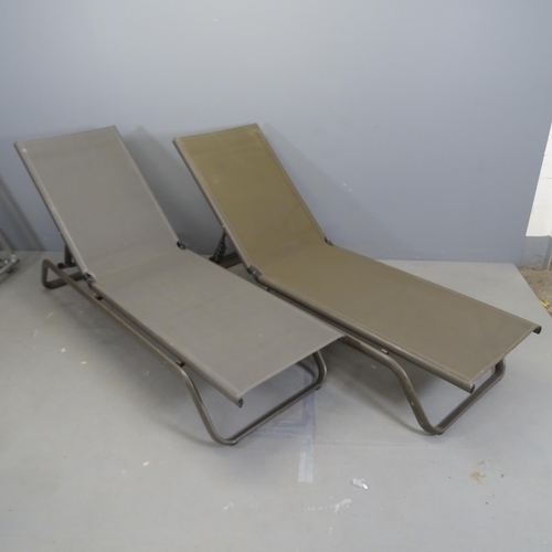 3238 - ATELIER ALINEA - a pair of Contemporary Swiss garden reclining sun loungers. With maker's label.... 