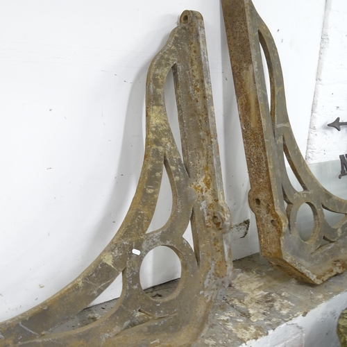 3240 - A pair of extra-large and impressive Victorian cast iron railway station canopy brackets. 120x105cm.