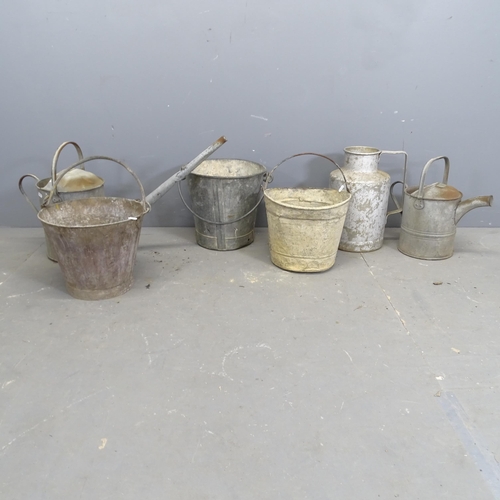 3254 - A group of galvanised items to include two watering cans, three buckets and a flagon. (6)