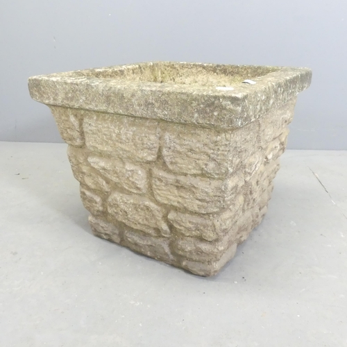 3300 - A weathered stone brick design square garden planter, 44x36cm, a terracotta chimney pot, and a foldi... 