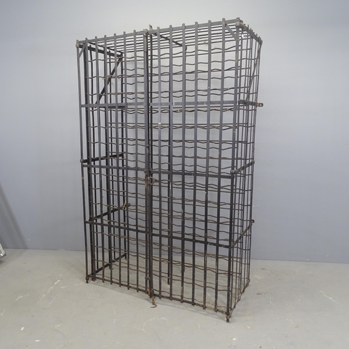 3264 - An antique French iron two-door wine cabinet. 106x164x53cm.