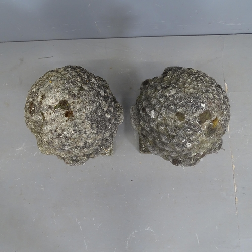 3274 - A pair of weathered concrete pineapple finials. 34x57cm.