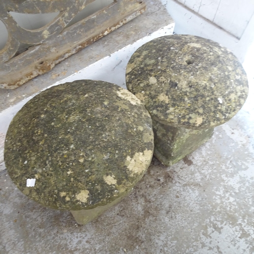 3283 - A pair of two-section weathered carved stone Staddle Stones. 56x65cm.