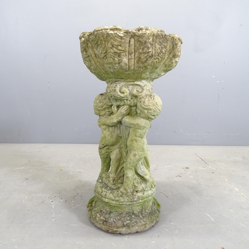 3284 - A weathered concrete bird bath. 31x55cm.