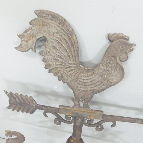 3286 - A vintage cast iron weather vane, surmounted by a cockerel. Height 90cm.